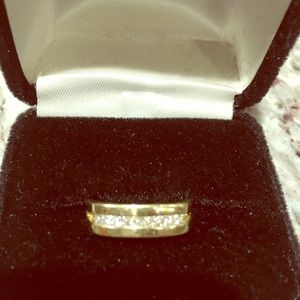 Men’s 14k gold w/ 1/2 k diamonds ring.